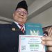 Wilson Lalengke Saat Mengambil Kartu Pass Masuk Gedung PBB, Siap Berpidato di Forum Internasional